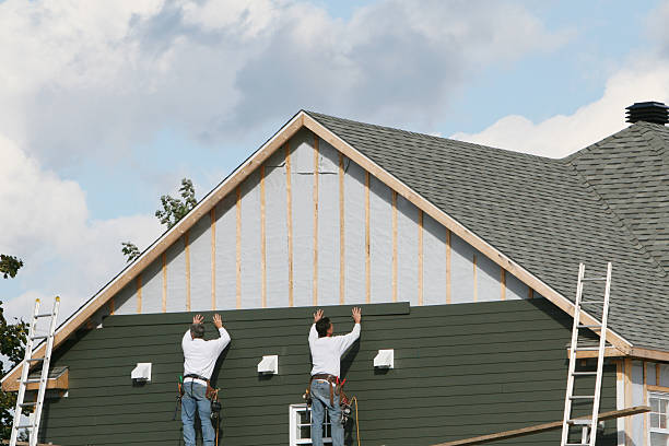 Professional Storm Damage Siding Repair technician working in Hookstown, PA
